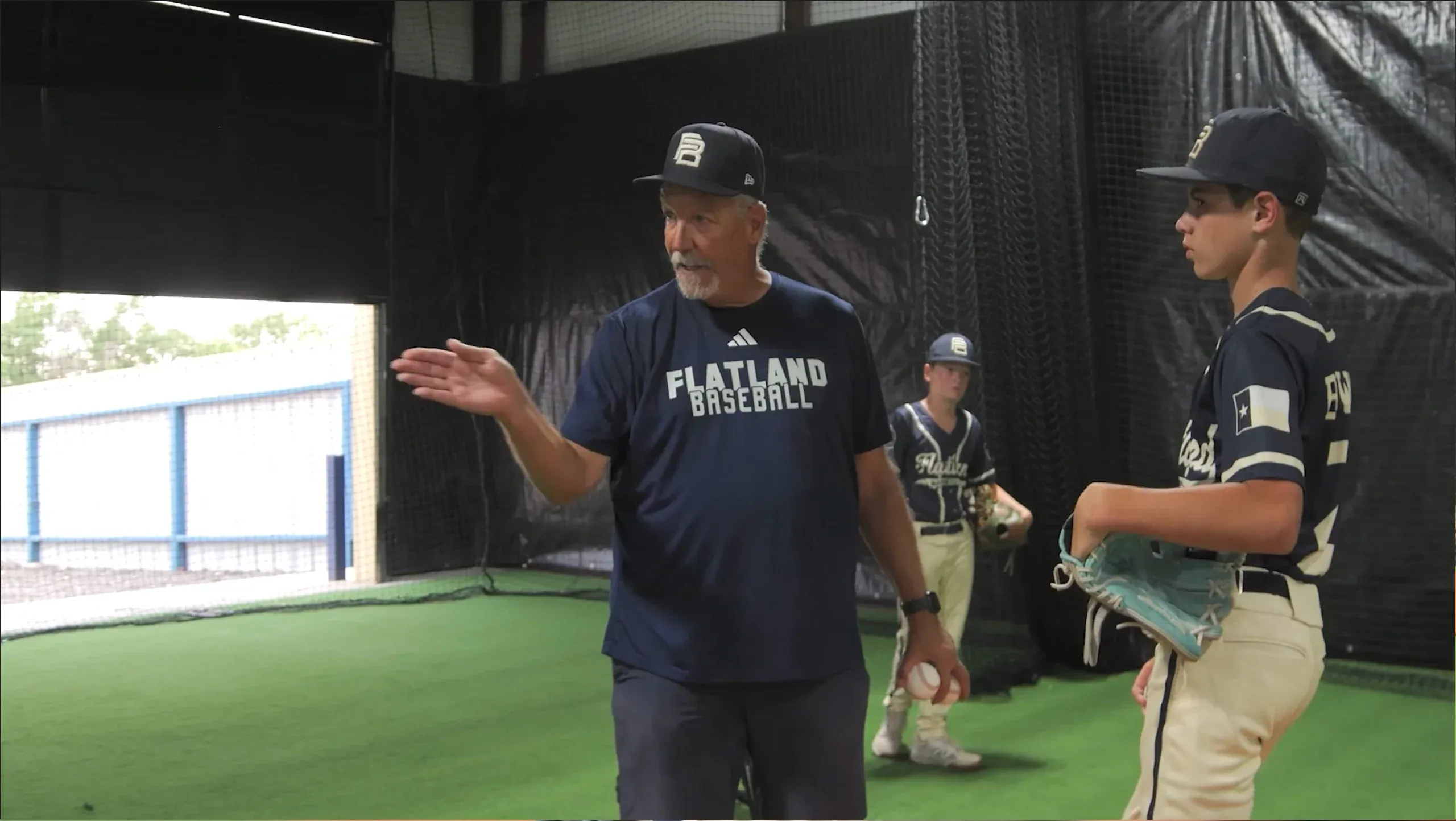 A Flatland instructor working with a player